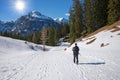 Mountaineer at winter hiking trail, tirolean landscape austria