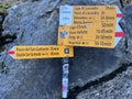 Mountaineering signposts and markings in the mountainous area of the alpine St. Gotthard Pass Gotthardpass - Switzerland