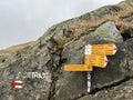 Mountaineering signposts and markings in the mountainous area of the alpine St. Gotthard Pass Gotthardpass - Switzerland