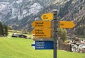 Mountaineering signposts and markings on the slopes of the alpine mountains above the Taminatal river valley and in the massif