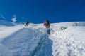 Mountaineers on the snow of mountain glacier in Himalaya summit ascent