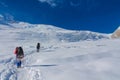 Mountaineers on the snow of mountain glacier in Himalaya summit ascent