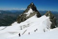 Mountaineers on snow and rocks