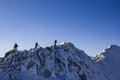 Mountaineers walk free in a row on the range of a snowy mountain on a clear day with very blue sky. Fidelagua, PeÃÂ±a Correa