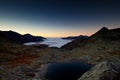 Mountain lake on sunrise in the italian alpes Royalty Free Stock Photo