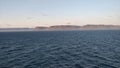 Mountainous coastline of Greenland seen from the Atlantic Ocean