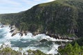 Mountainous Landscape with the beautiful beach and the famous Storms River Bridge at Tsitsikamma National Park in South Africa Royalty Free Stock Photo