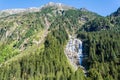 Mountainous landscape with Grawa waterfall 180m in Stubaital valley in Tyrol, Austria