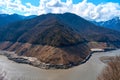 A mountainous landscape with a large dewatered mountain river Royalty Free Stock Photo