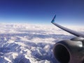 Mountains airplane snow in air Royalty Free Stock Photo