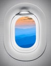 Mountains at airplane window Royalty Free Stock Photo