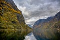 Mountains in the autumn season that reflect the water at Flam in Norway Royalty Free Stock Photo