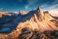 Mountains with beautiful house and church at sunset in autumn Royalty Free Stock Photo