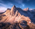 Mountains with beautiful house and church at sunset in autumn Royalty Free Stock Photo