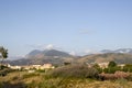 Mountains with Blue Sky and Clouds. Mountain Peak with Green Grass and Blue Sky. Fantastic Shot. Natural Landscape, Meadows and