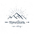 Mountains are calling hand lettering with abstract watercolor splatters