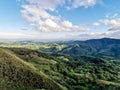 Mountains in cerro pelado, costa rica.green mountains with hills and blue skyat sunrise