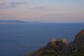 with the mountains city alanya opens with beautiful views of the Mediterranean sea and the ancient fortress. sunset, pink clouds