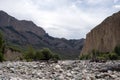 Mountains cliff with erroded soil. Wild outdoor landscape. Adventure tourism. Royalty Free Stock Photo