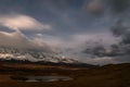 Mountains clouds stars lake sky night