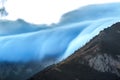 Mountains in clouds at sunset Royalty Free Stock Photo