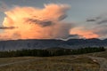 Mountains clouds sunset pink road Royalty Free Stock Photo