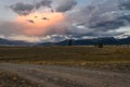 Mountains clouds sunset pink road Royalty Free Stock Photo