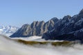 Mountains and clouds in the valley. Natural landscape high in the mountains. Grindewald, Switzerland. Royalty Free Stock Photo