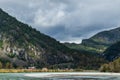 Mountains cloudy road near river nature travel