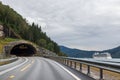 Mountains cloudy road to tunnel travel Norway