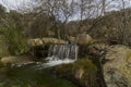 Water streams, rocks, trees and beatiful sky.Hoyo de Manzanares, Madrid, Spain.