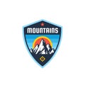 Mountains - concept badge. Climbing logo in flat style. Extreme exploration sticker symbol. Camping & hiking creative vector