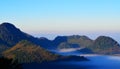 Mountains covered with fog