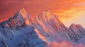 Mountains covered in snow and clouds at sunset with a pink sky Royalty Free Stock Photo