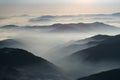 Mountains and mountains, crest and low clouds Royalty Free Stock Photo
