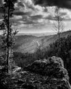 mountains with a distant path going up the hill