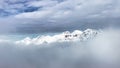 Mountains emerge from the fog after a snowfall Royalty Free Stock Photo