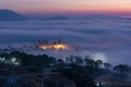Mountains in fog at beautiful morning in autumn in Dalat city, Vietnam. Royalty Free Stock Photo