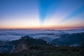 Mountains in fog at beautiful morning in autumn in Dalat city, Vietnam. Royalty Free Stock Photo