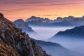 Mountains in fog at beautiful sunset in autumn. Dolomites, Italy Royalty Free Stock Photo