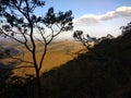 Mountains, forest and blue sky with clouds