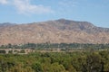 Mountains and Forest with Highway and Power Lines Cutting Through Royalty Free Stock Photo