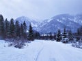 Mountains and forests in Austria, snowy landscape with signs