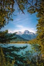 Mountains Framed By Lush Trees Royalty Free Stock Photo