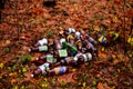 Mountains and garbage plastic bottles of beer and drinks, people throw on the road. Royalty Free Stock Photo