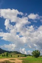 Mountains green grass and blue sky Royalty Free Stock Photo