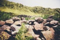 Mountains green valley with ancient stones fence Landscape