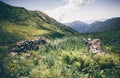 Mountains green valley with ancient stones fence Landscape