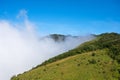 Mountains have forests and green meadows, misty mornings and blue skies Royalty Free Stock Photo