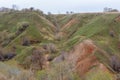 Mountains and hills on the coast of the river Volga. Beautiful patterns of rocks, meadows, green grass and trees. Beautiful spring Royalty Free Stock Photo